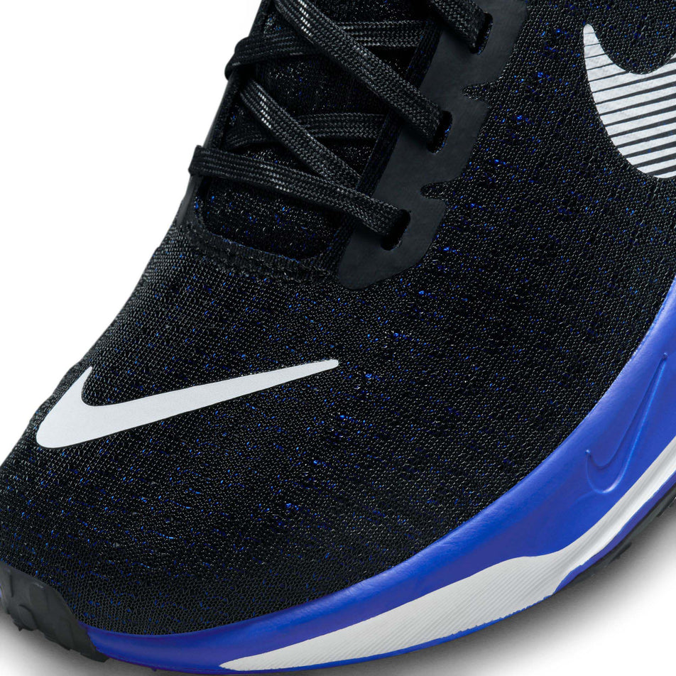 Lateral side of the toe box on the left shoe from a pair of Nike Men's Invincible 3 Road Running Shoes in the Black/White-Racer Blue-High Voltage colourway (7970751381666)