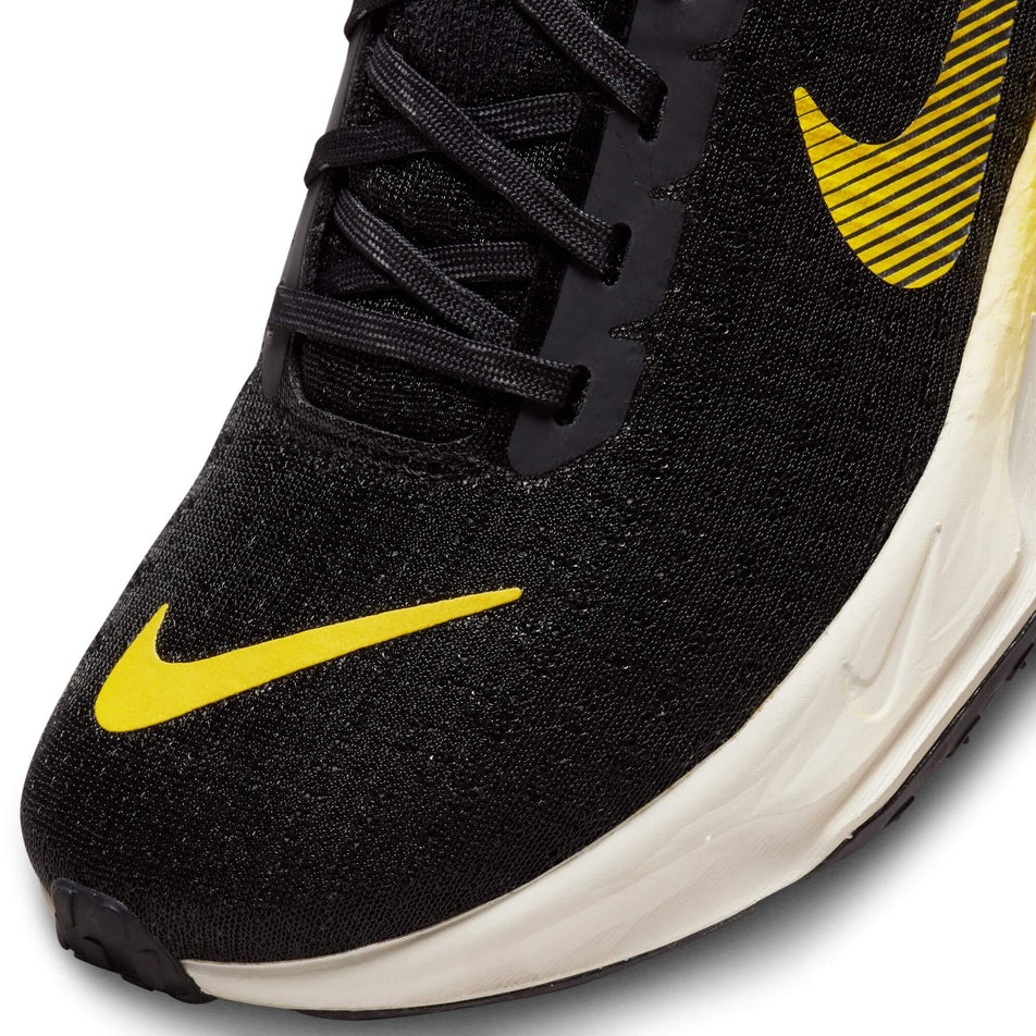 Toe box of the left shoe from a pair of Nike Women's Invincible 3 Road Running Shoes in the BLACK/WHITE-ANTHRACITE-BALTIC BLUE colourway (7867354644642)