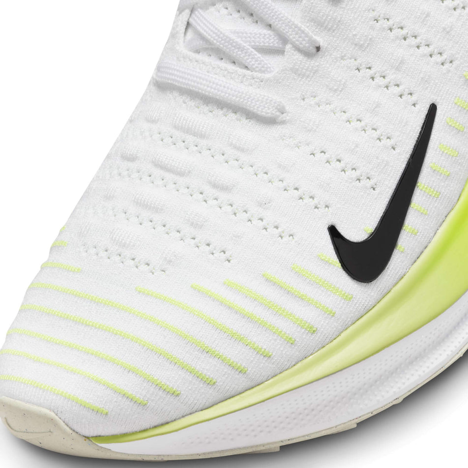 Lateral side of the toe box on the left shoe from a pair of Nike Men's Infinity RN 4 Road Running Shoes in the White/Black-LT Lemon Twist-Volt colourway (7979596644514)