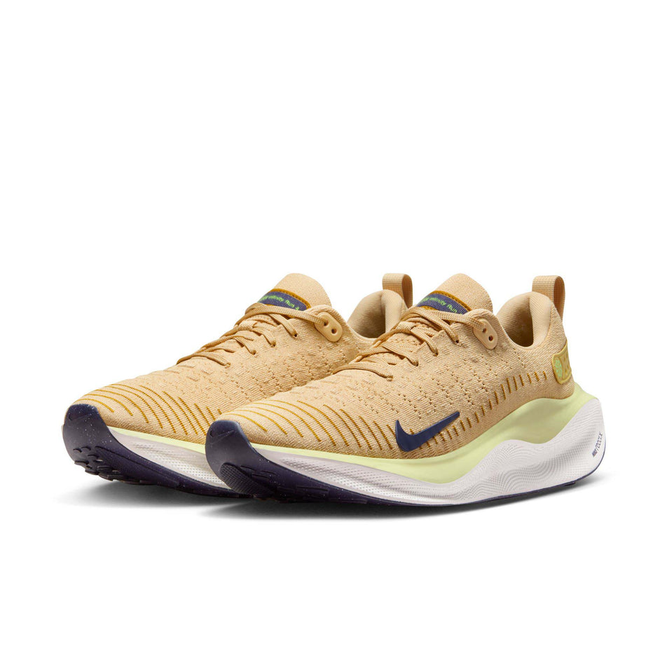 A pair of Nike Men's Infinity RN 4 Road Running Shoes in the Sesame/Purple Ink-Buff Gold colourway (8073016475810)