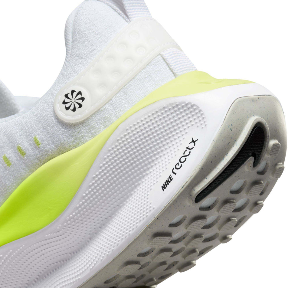 Lateral side of the back of the left shoe from a pair of Nike Women's Infinity RN 4 Road Running Shoes in the White/Black-LT Lemon Twist-Volt colurway (7979397054626)