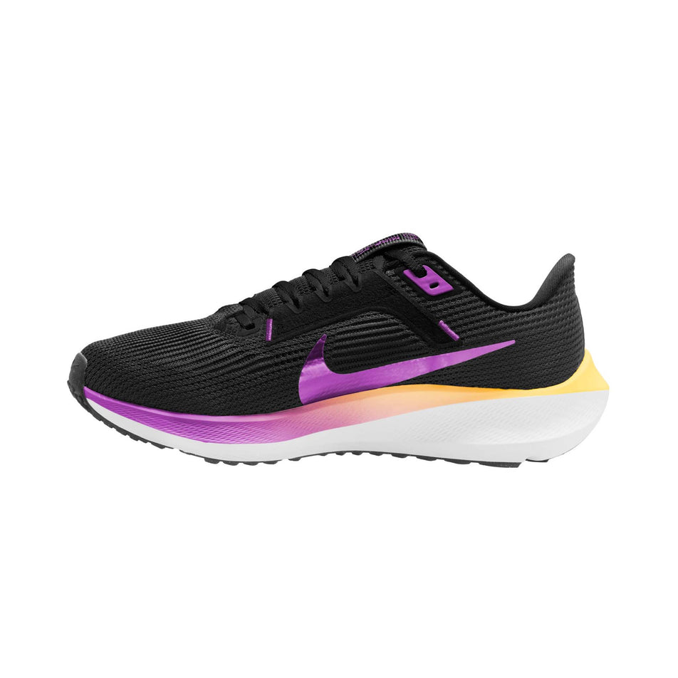 Medial side of the right shoe from a pair of Nike Women's Pegasus 40 Road Running Shoes in the Black/Hyper Violet-Laser Orange-White colourway (8139930992802)