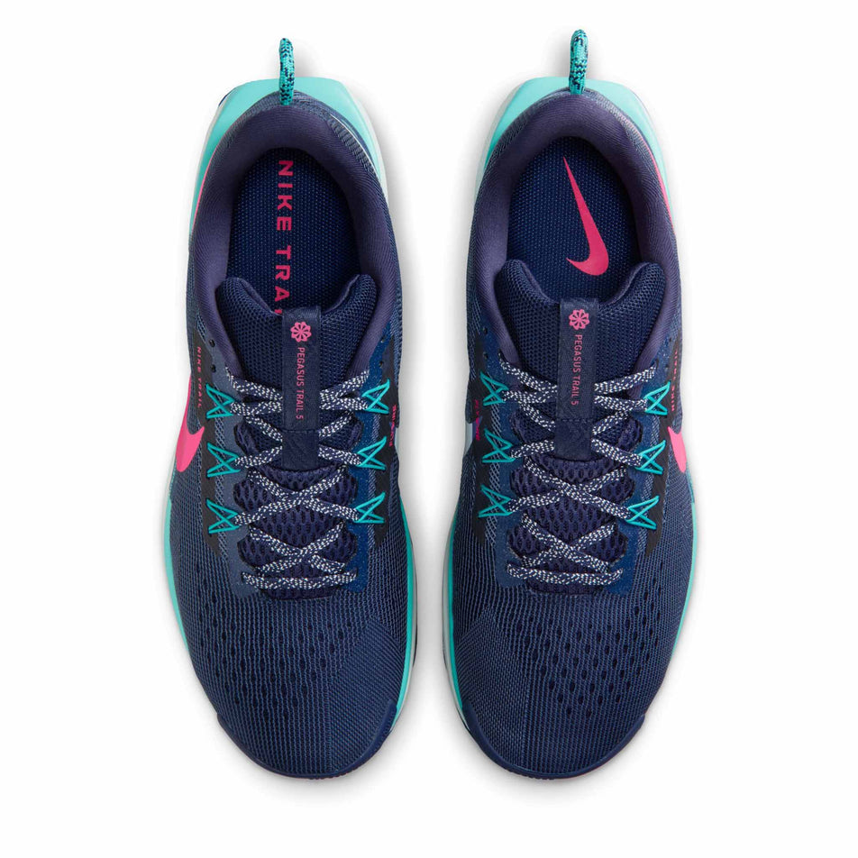 The uppers of a pair of Nike Men's Pegasus Trail 5 Trail Running Shoes in the Midnight Navy/Hyper Pink-Dusty Cactus colourway.