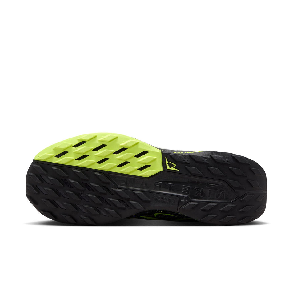 The outsole of the left shoe from a pair of Nike Women's Pegasus Trail 5 Running Shoes in the Black/Phantom-Volt Ice colourway.