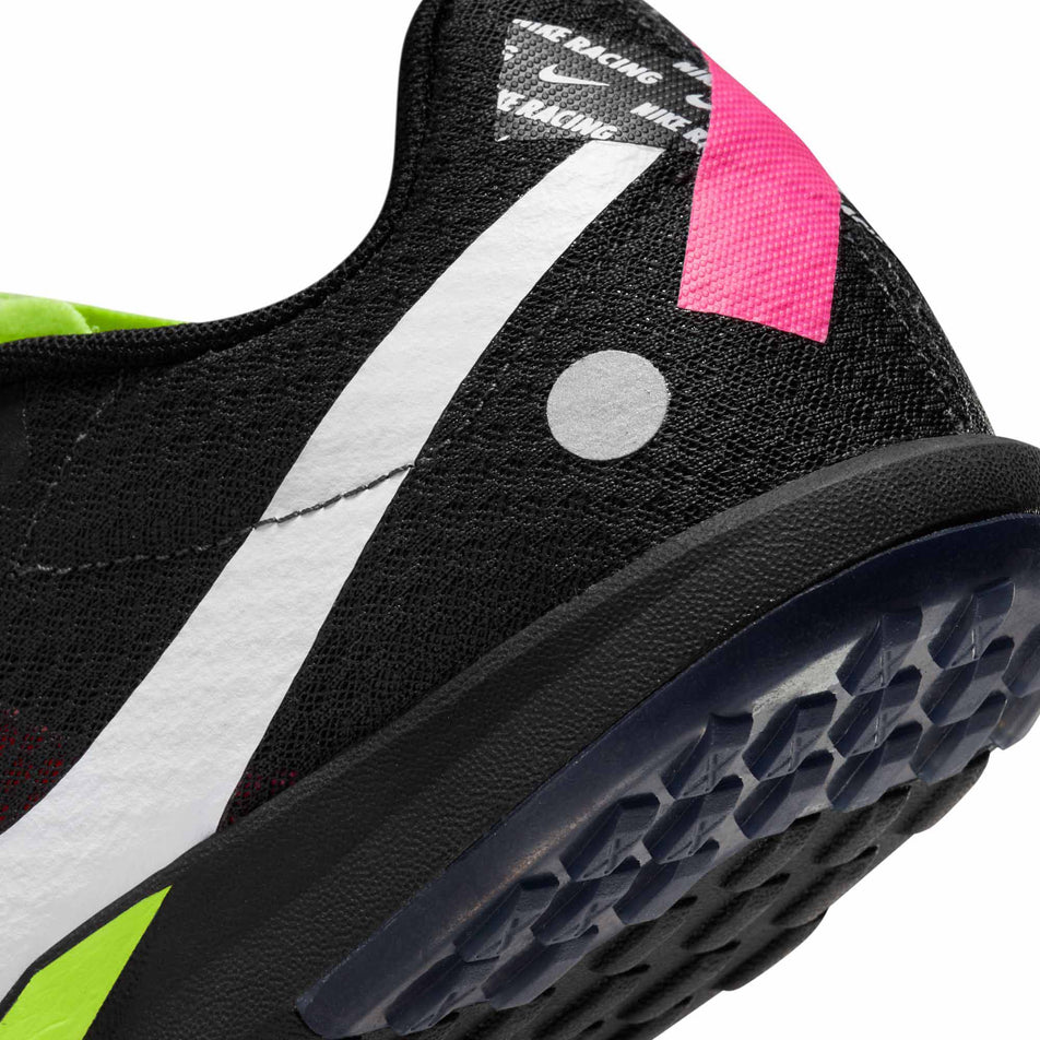 Lateral side of the back of the left shoe from a pair of Nike Unisex Rival XC 6 Cross-Country Spikes in the Volt/White-Black-Hyper Pink colourway (8064173211810)