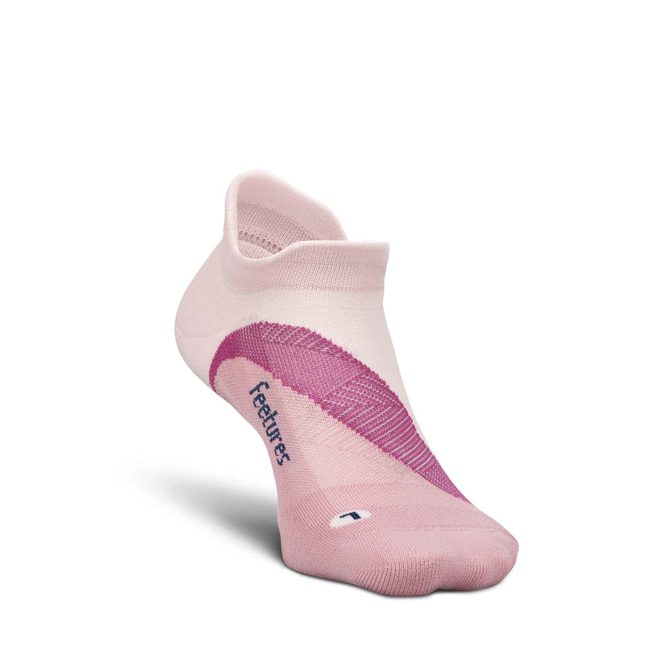 Medial view of the left sock from a pair of Feetures Unisex Elite Light Cushion No Show Tab in the Pink Salt colourway.