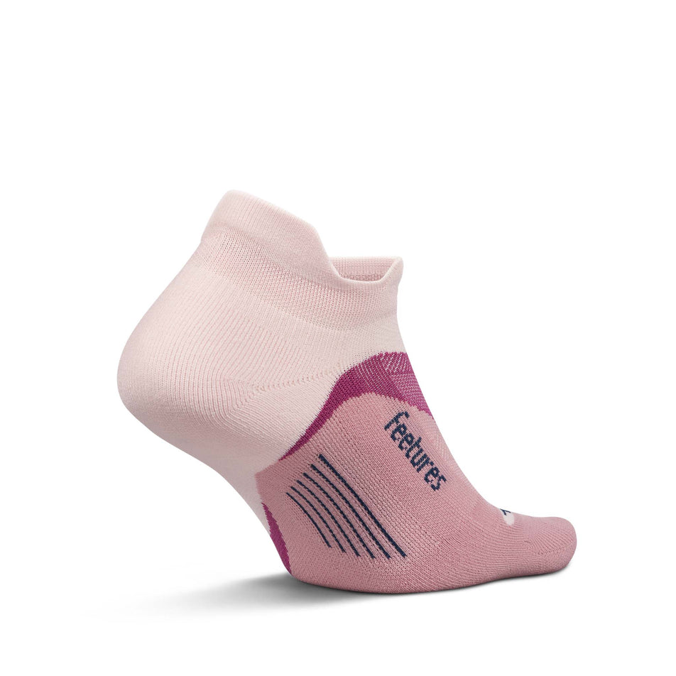 Medial view of the left sock from a pair of Feetures Unisex Elite Light Cushion No Show Tab in the Pink Salt colourway.