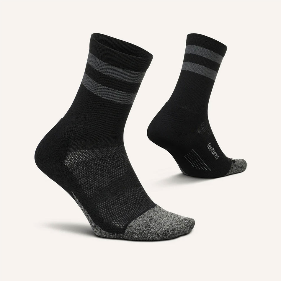 A pair of Feetures Unisex Elite Light Cushion Mini Crew running socks in the Black High Top Stripe colourway (7561625338018)