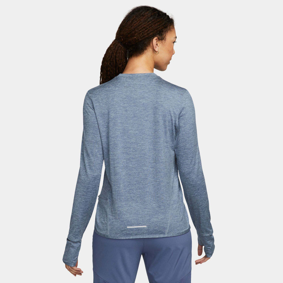 Back view of a model wearing a Women's Dri-FIT Swift Element UV Crew-Neck Running Top in the Ashen Slate/Reflective Silv colourway (8049589387426)