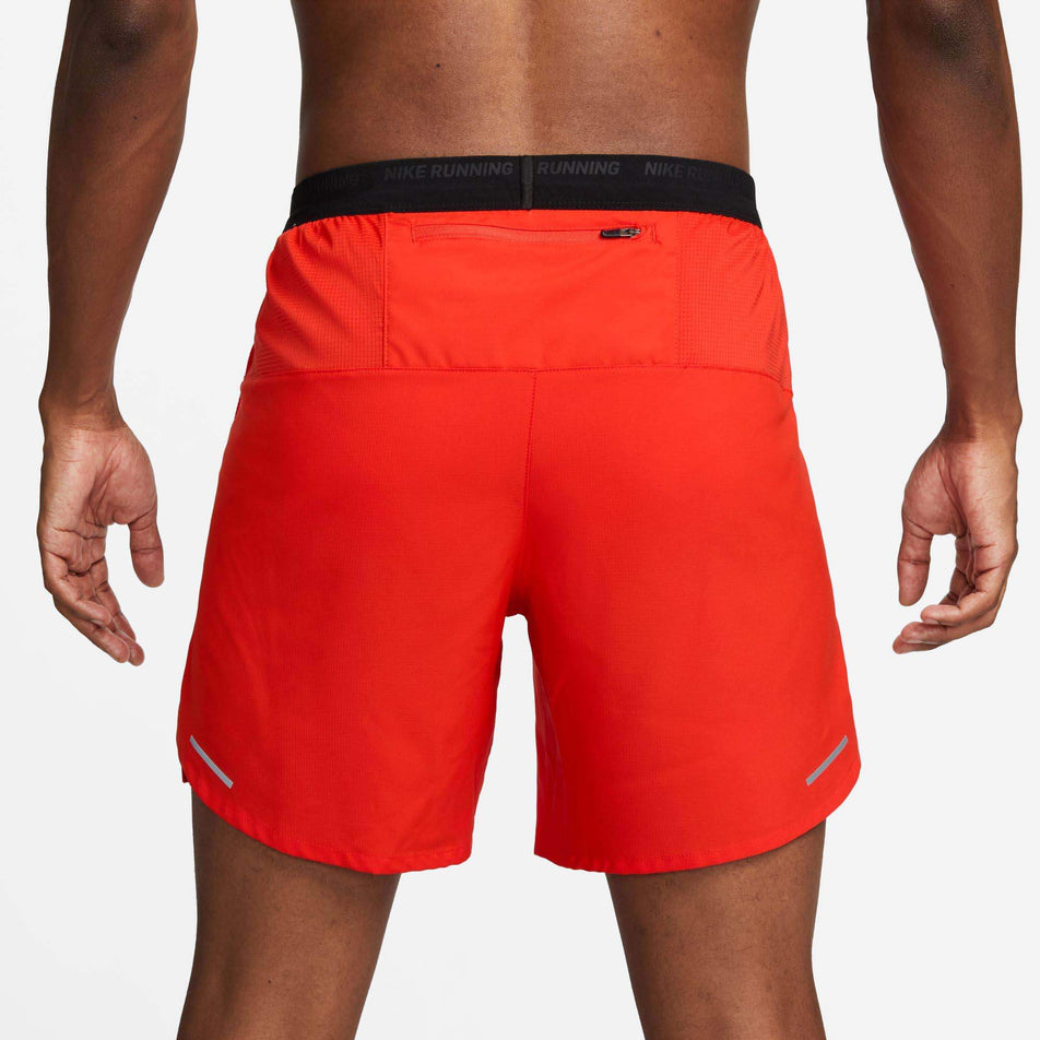 Back view of a model wearing a pair of Nike Men's Dri-FIT Stride Kipchoge 7