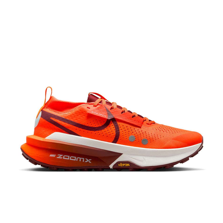 Lateral view of the right shoe from a pair of Nike Men's Zegama Trail 2 Running Shoes in the Hyper Crimson/Dark Team Red-Glacier Blue colourway. (8724585021602)