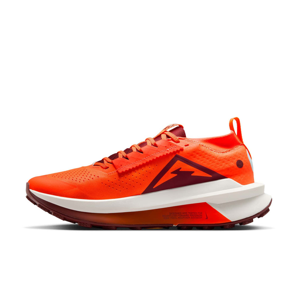 Medial view of the right shoe from a pair of Nike Men's Zegama Trail 2 Running Shoes in the Hyper Crimson/Dark Team Red-Glacier Blue colourway. (8724585021602)