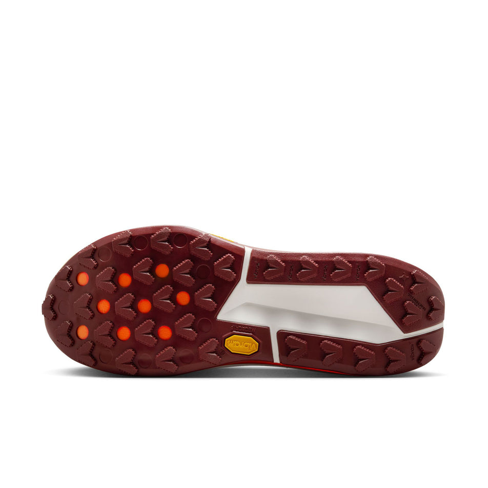 The outsole of the left shoe from a pair of Nike Men's Zegama Trail 2 Running Shoes in the Hyper Crimson/Dark Team Red-Glacier Blue colourway. (8724585021602)