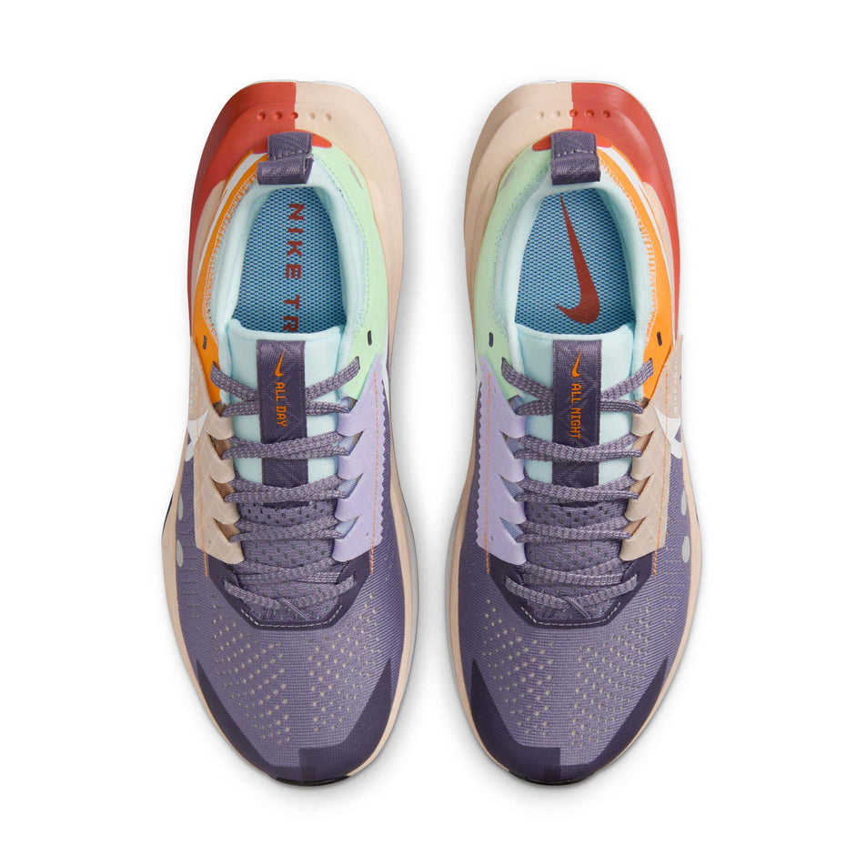 The uppers on a pair of Nike Women's Zegama Trail 2 Trail Running Shoes in the Daybreak/White-Cosmic Clay-Sundial colourway (8283080655010)