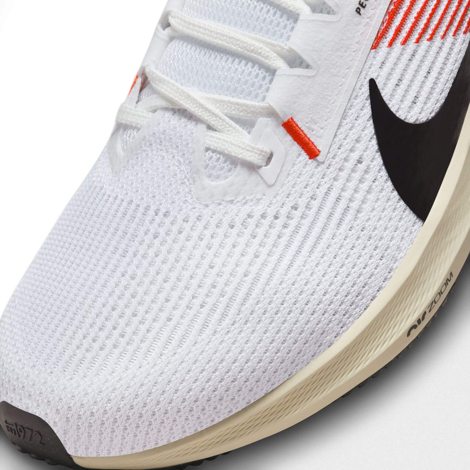 Lateral side of the toe box on the left shoe from a pair of Nike Men's Pegasus 40 