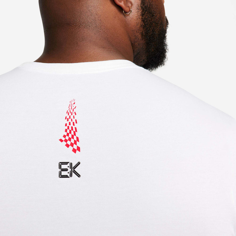 Close-up back view of a model wearing a Nike Men's Eliud Kipchoge Dri-FIT Running T-Shirt in the White colourway. Upper half of the t-shirt is visible in the image.  (8029388964002)