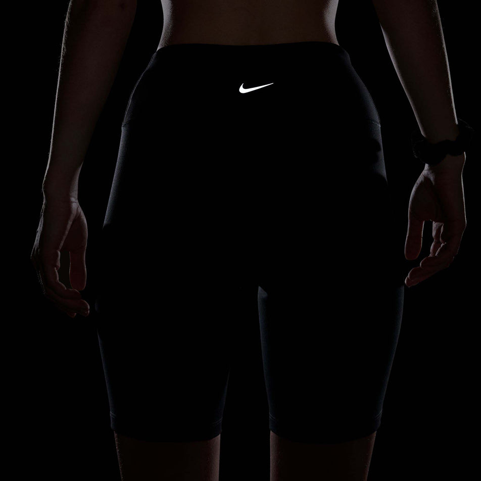 Back view of a model wearing a pair of Nike Women's One High-Waisted 8