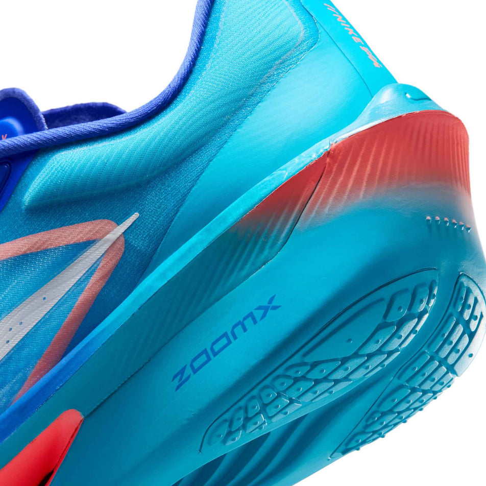 Close-up view of the rearfoot section of the left shoe from a pair of Nike Men's Zoom Fly 6 Road Running Shoes in the Racer Blue/White-Blue Lightning colourway.