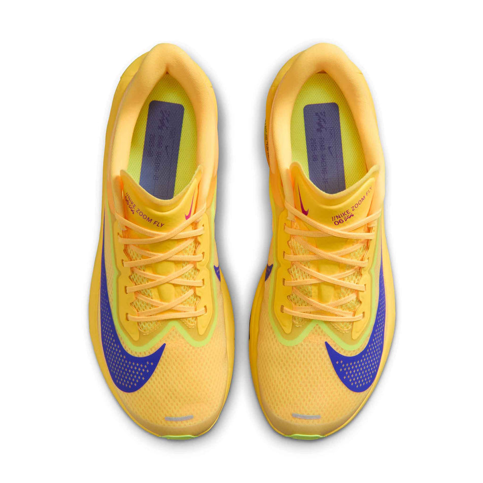 The uppers of a pair of Nike Men's Zoom Fly 6 Road Running Shoes in the Citron Pulse/Indigo Burst-Volt Ice colourway.