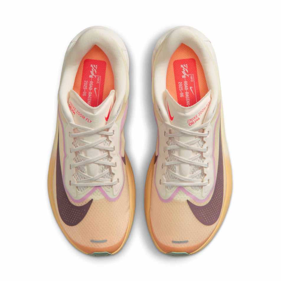 The uppers of a pair of Nike Women's Zoom Fly 6 Road Running Shoes in the Sail/Tattoo-Light Magenta-Pearl Pink colourway.