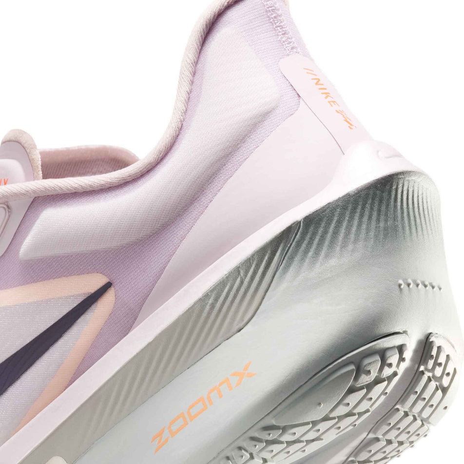 Close-up view of the rearfoot section of the left shoe from a pair of Nike Women's Zoom Fly 6 Road Running Shoes in the Bleached Lilac/Purple Dynasty-Volt Tint colourway.