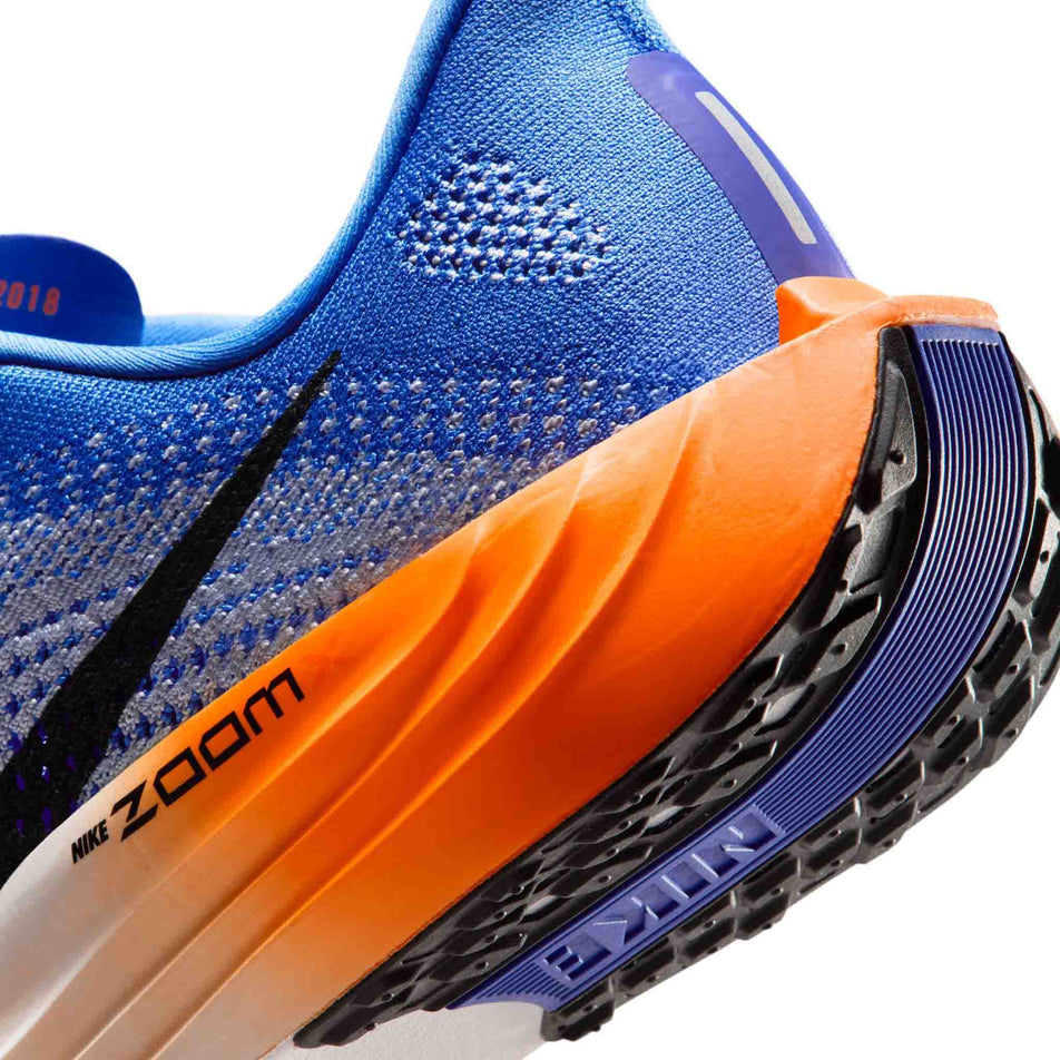 Close-up view of the rearfoot section of the left shoe from a pair of Nike Men's Pegasus Plus Road Running Shoes in the Crystal Blue/Off-Noir-Hydrogen Blue colourway.