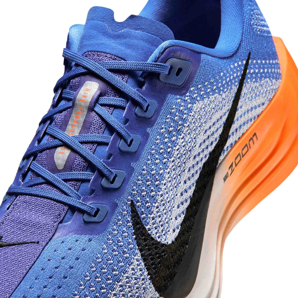 Close-up view of the upper of the left shoe from a pair of Nike Men's Pegasus Plus Road Running Shoes in the Crystal Blue/Off-Noir-Hydrogen Blue colourway.