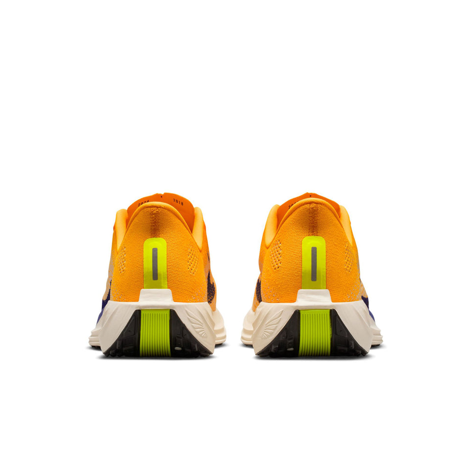 The back of a pair of Nike Men's Pegasus Plus Road Running Shoes in the Laser Orange/Indigo Burst-Alabaster-Sail colourway.