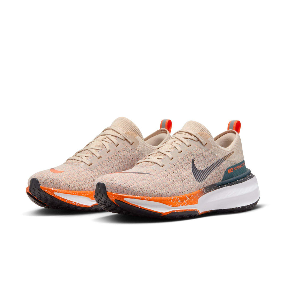 A pair of Nike Men's Invincible Run 3 Road Running Shoes in the Oatmeal/Black-Safety Orange-Total Orange colourway (8073007661218)