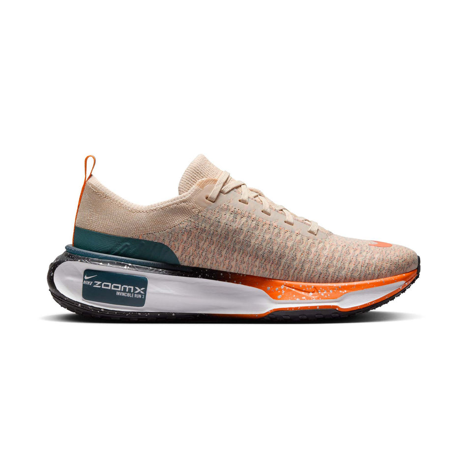Medial side of the left shoe from a pair of Nike Men's Invincible Run 3 Road Running Shoes in the Oatmeal/Black-Safety Orange-Total Orange colourway (8073007661218)
