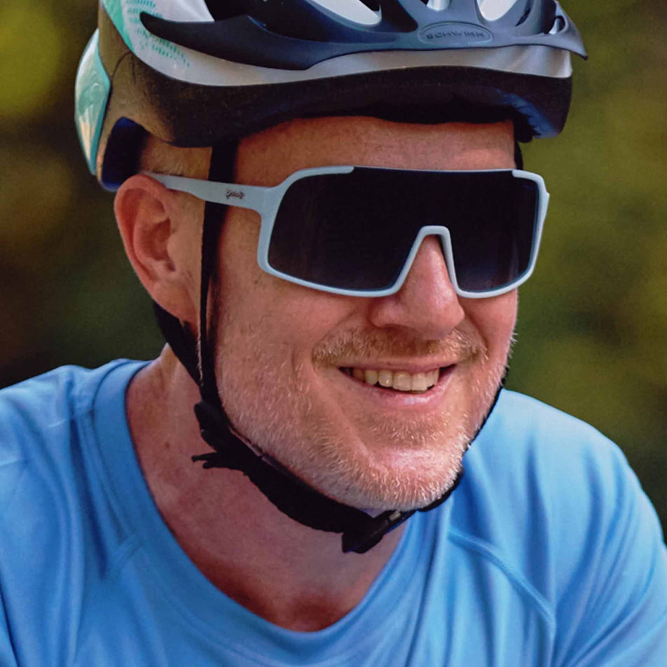 Side view of a model wearing the goodr Kidnapped by a Cyborg - Astro G - Sunglasses.