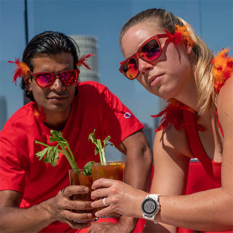 Two models, each wearing a pair of goodr Phoenix At A Bloody Mary Bar - OG - Running Sunglasses