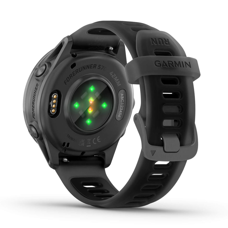 A Garmin Forerunner 570 in the 42mm case size. Slate Grey Aluminium with Translucent Black/Black Band. Back of watch and wrist-based heart rate monitor. (8691978961058)