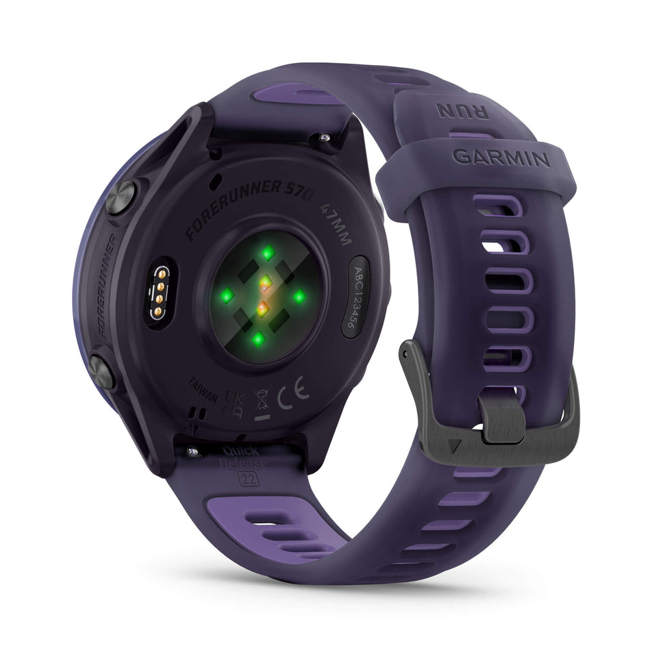 A Garmin Forerunner 570 in the 47mm case size. Indigo Aluminium with Translucent Imperial Purple/Indigo Band. Back of watch and wrist-based heart rate monitor. (8692392231074)