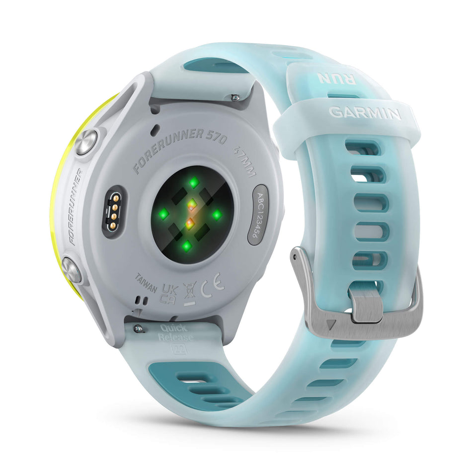A Garmin Forerunner 570 in the 47mm case size. Amp Yellow Aluminium with Translucent Whitestone/Turquoise Band. Back of watch and wrist-based heart rate monitor. (8692386529442)