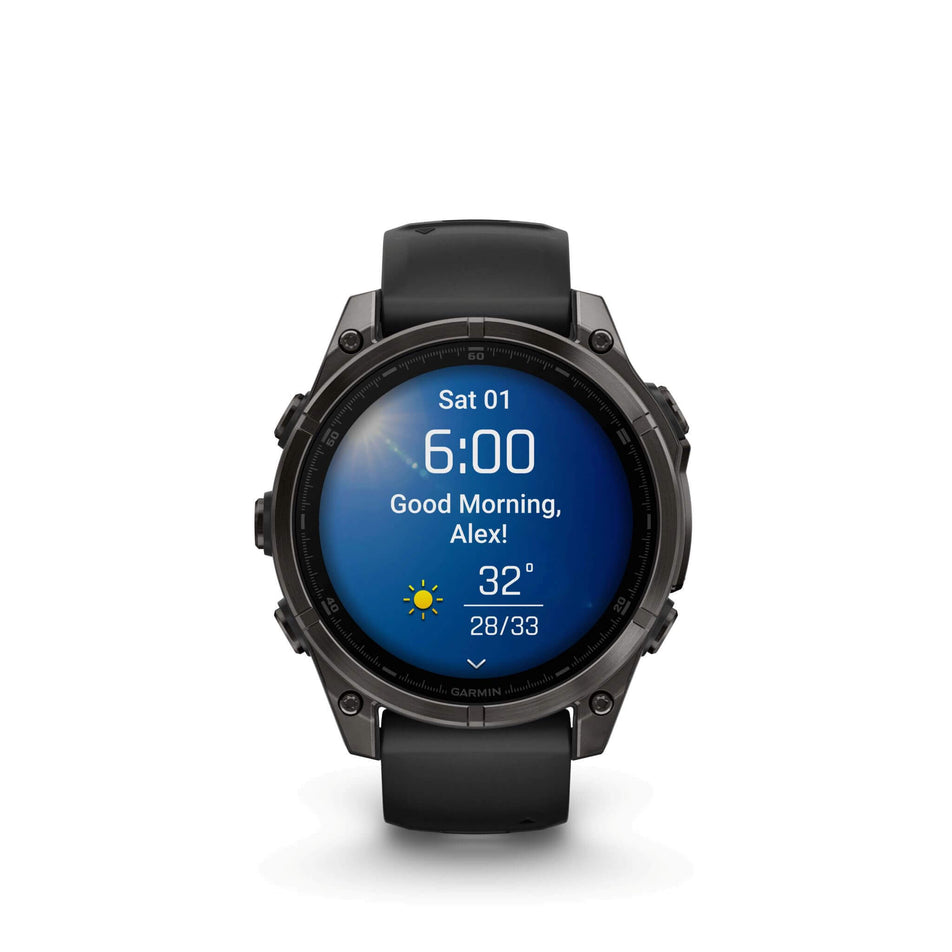 A Garmin fēnix 8 in the 47mm case size. Carbon grey DLC with Black/pebble grey silicone band. Morning report screen.