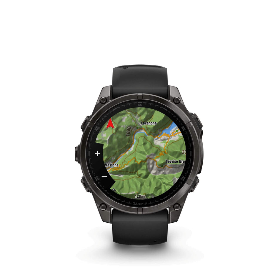 A Garmin fēnix 8 in the 47mm case size. Carbon grey DLC with Black/pebble grey silicone band. Topo map screen.