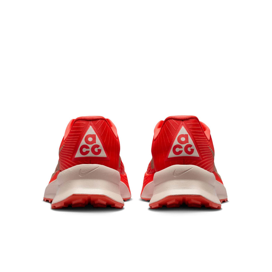 The back of a pair of Nike Unisex ACG Ultrafly Trail Racing Shoes in the Light Crimson/Pure Platinum-Summit White colourway.
