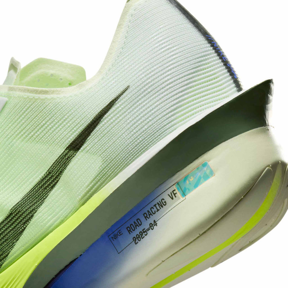 Close-up view of the rearfoot section of the left shoe from a pair of Nike Men's Vaporfly 4 Road Racing Shoes in the Barely Green/Black Spruce-Volt Tint colourway.