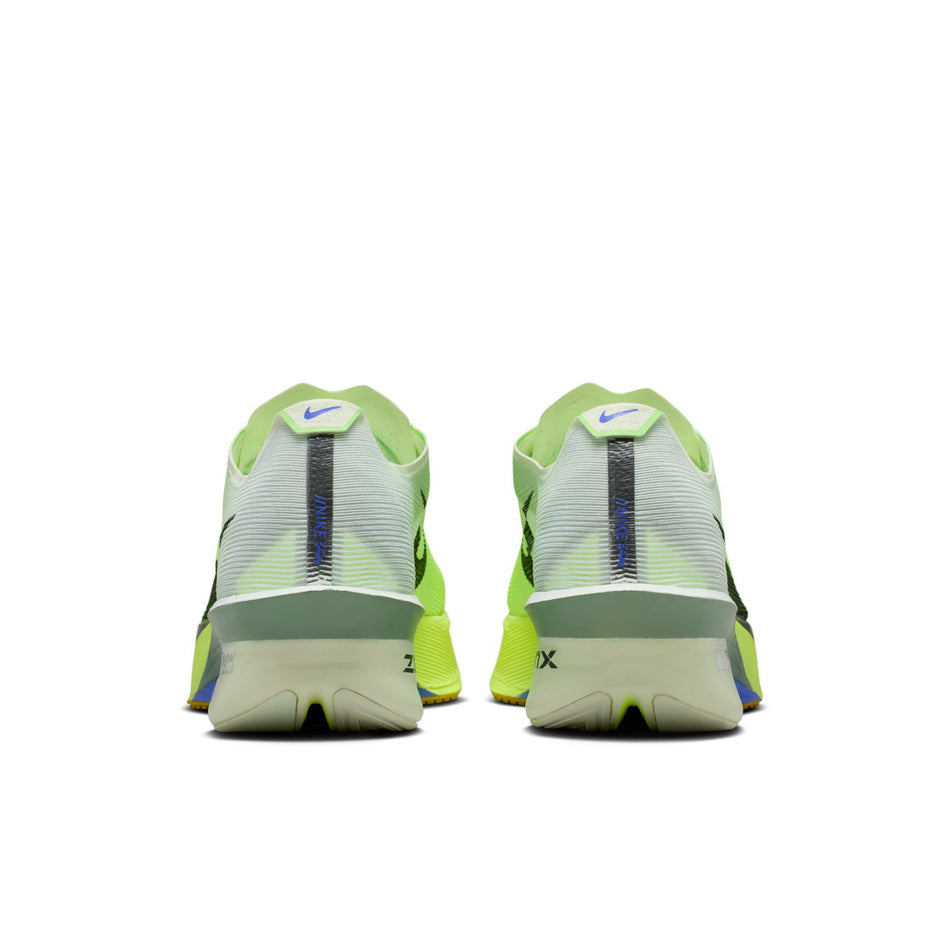 The back of a pair of Nike Men's Vaporfly 4 Road Racing Shoes in the Barely Green/Black Spruce-Volt Tint colourway.