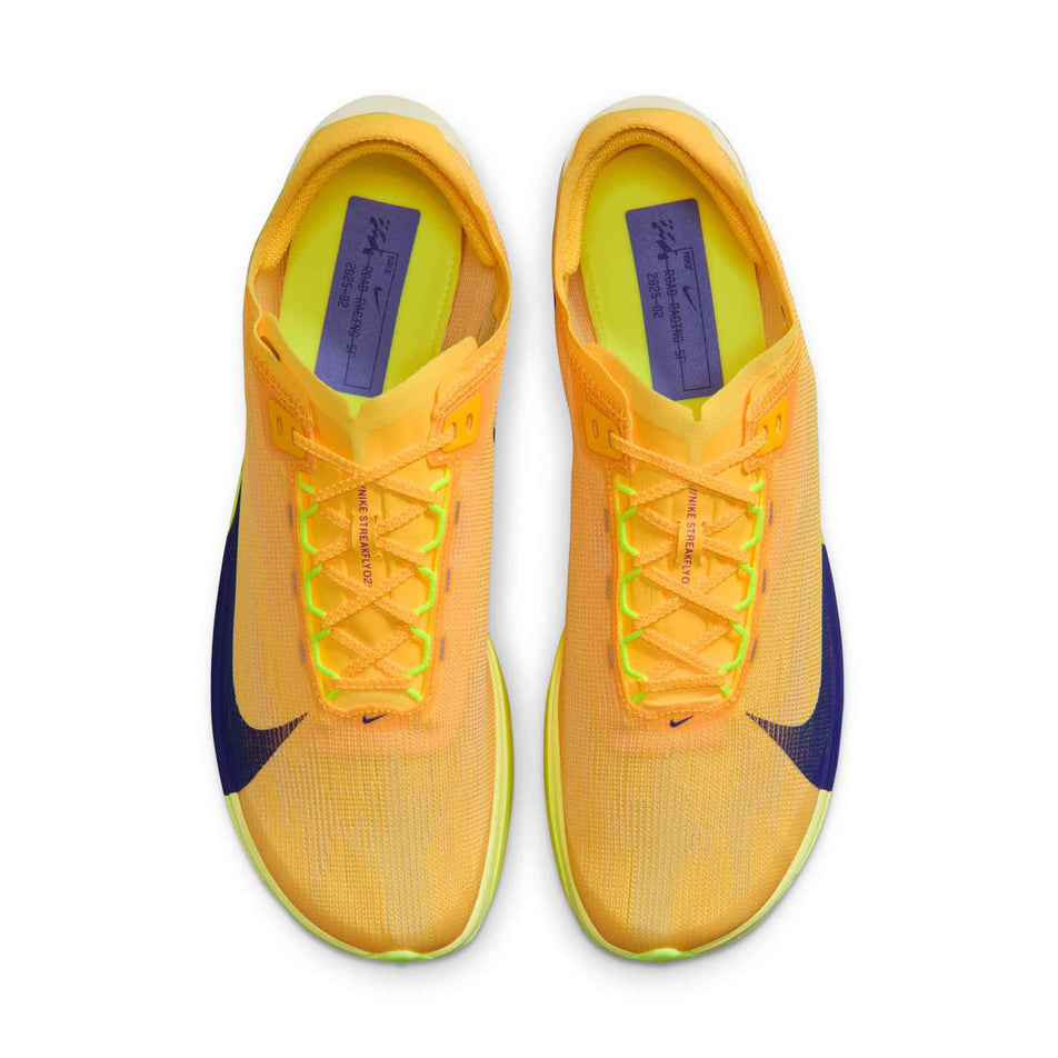 The uppers of a pair of Nike Men's Streakfly 2 Road Racing Shoes in the Citron Pulse/Indigo Burst-Volt Ice colourway.