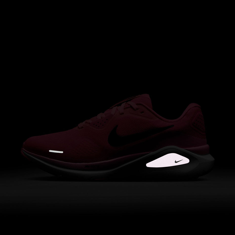 The reflective graphic on the lateral side of the left shoe from a pair of Nike Women's Structure 26 Road Running Shoes in the Hyper Pink/Black-Pink Spell-White colourway. (8686794997922)