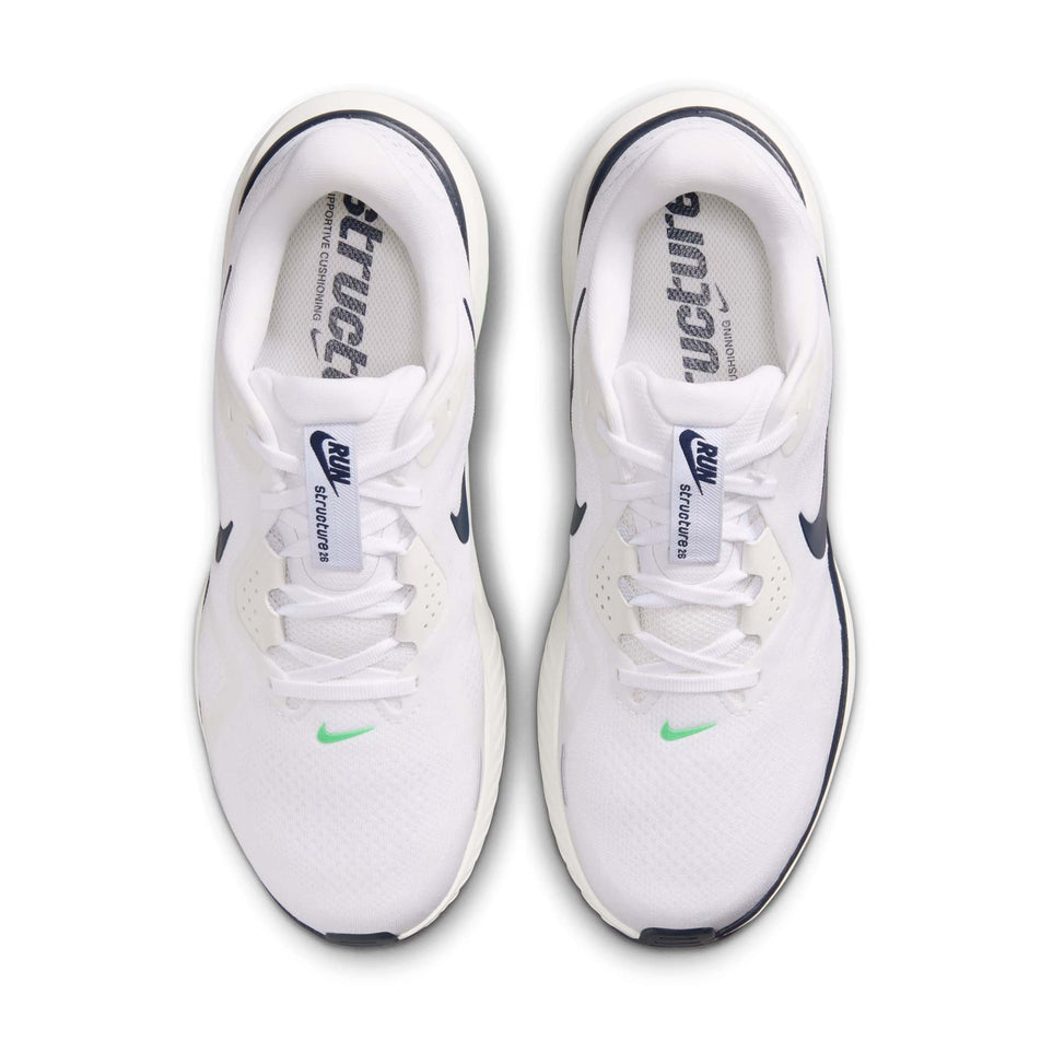 The uppers of a pair of Nike Men's Structure 26 Road Running Shoes in the White/Midnight Navy-Green Spark colourway.