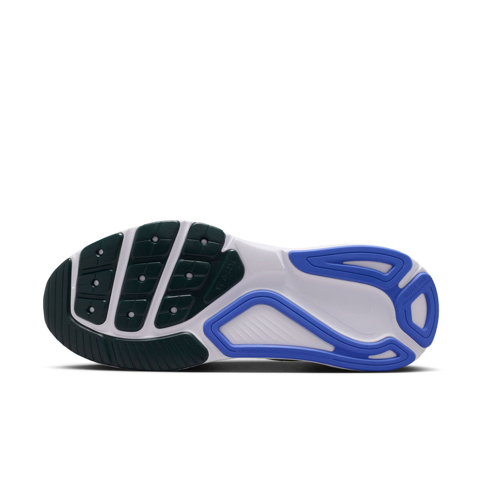 The outsole of the left shoe from a pair of Nike Men's Structure 26 Road Running Shoes in the Volt Tint/Black Spruce-Lime Blast colourway.