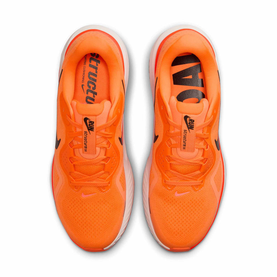 The uppers of a pair of Nike Men's Structure 26 Road Running Shoes in the Total Orange/Black-Total Crimson Chalk colourway. (8723638255778)