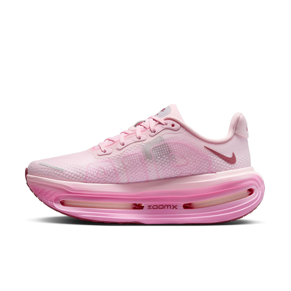 Medial view of the right shoe from a pair of Nike Women's Vomero Premium Road Running Shoes in the Pink Foam/Pink Smoke-Pink Rise colourway.