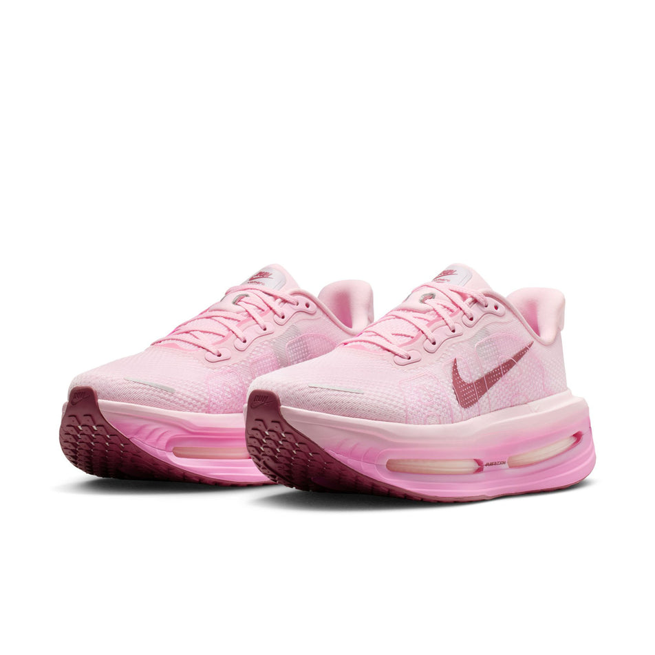 A pair of Nike Women's Vomero Premium Road Running Shoes in the Pink Foam/Pink Smoke-Pink Rise colourway.