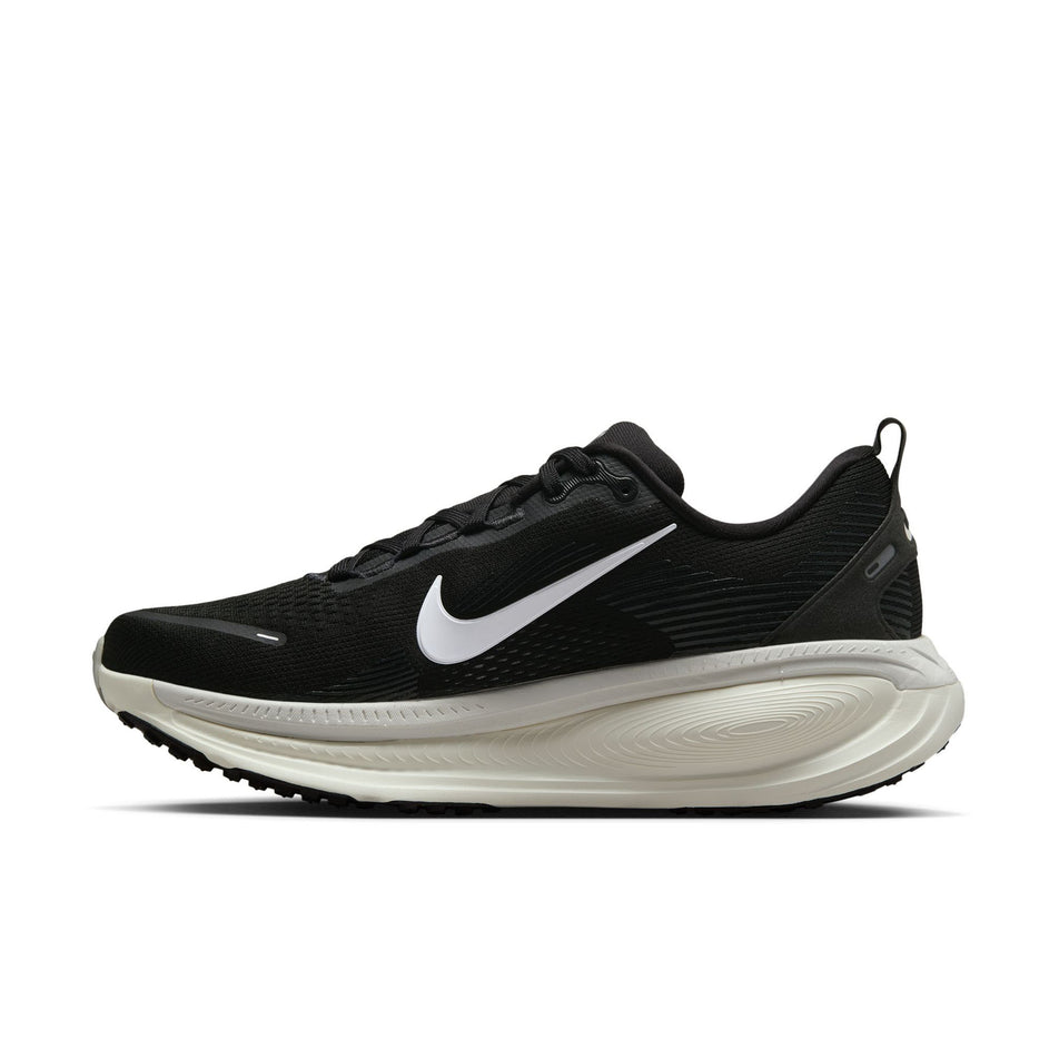 Medial view of the right shoe from a pair of Nike Men's Vomero 18 Road Running Shoes in the Black/Summit White-Coconut Milk colourway. (8684566708386)