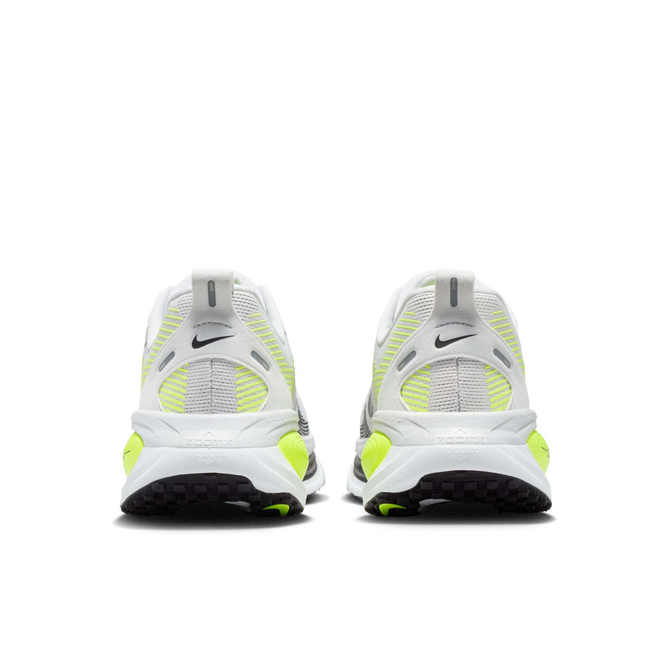 The back of a pair of Nike Men's Vomero 18 Road Running Shoes in the Photon Dust/Black-Volt colourway.