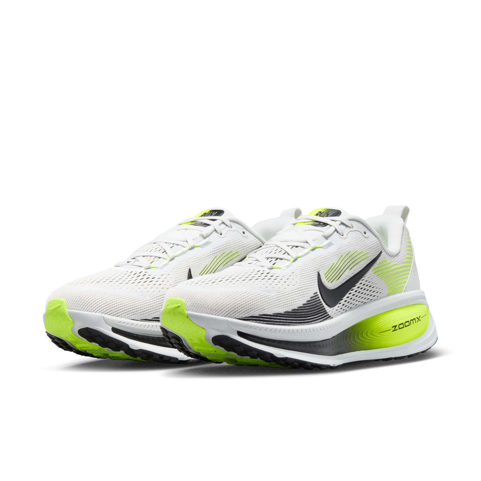 A pair of Nike Men's Vomero 18 Road Running Shoes in the Photon Dust/Black-Volt colourway.
